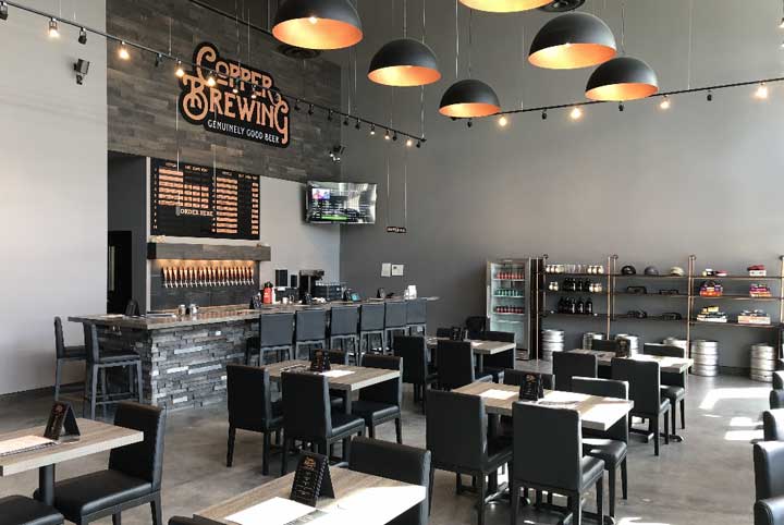 image of table with food and drinks at Copper Brewing